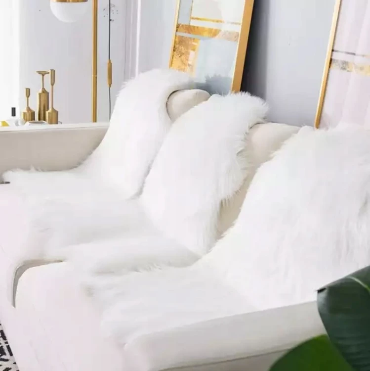 Sztuczna skóra owcza 140x85 cm biała do salonu